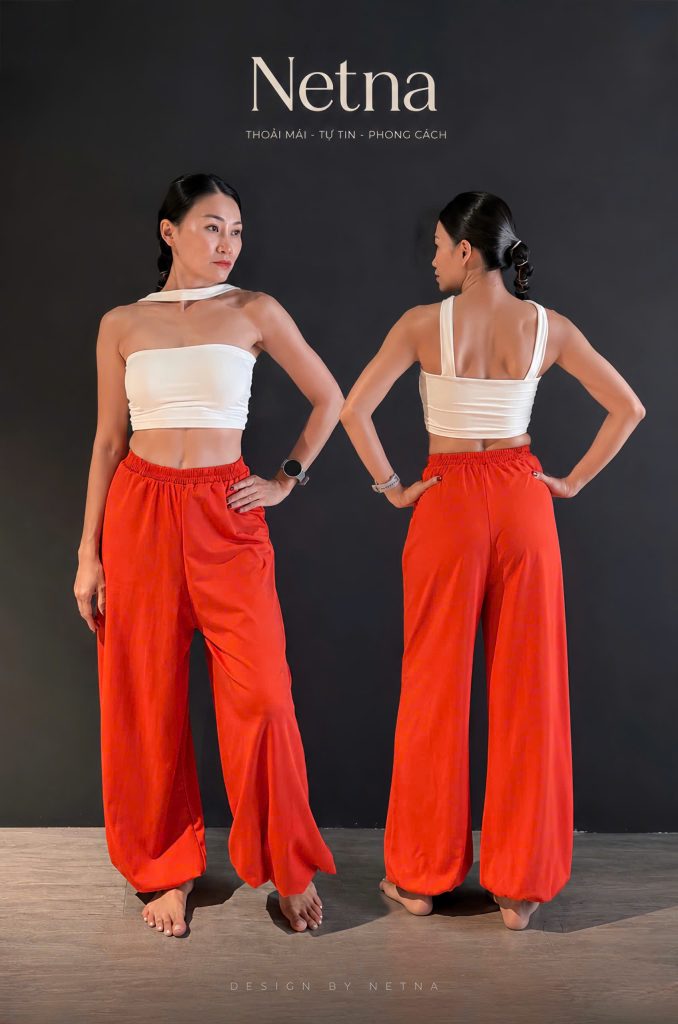 Set đồ tập yoga và dance phối màu cam trắng áo quây chéo cổ và quần aladdin dáng boom NETNA